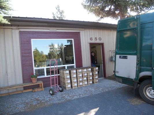 Studio outside - boxes of clay waiting to be turned into beautiful pottery