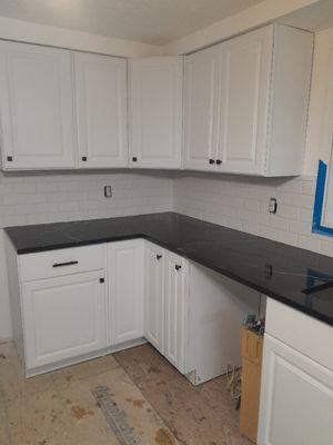 Cabinetry and tile back splash