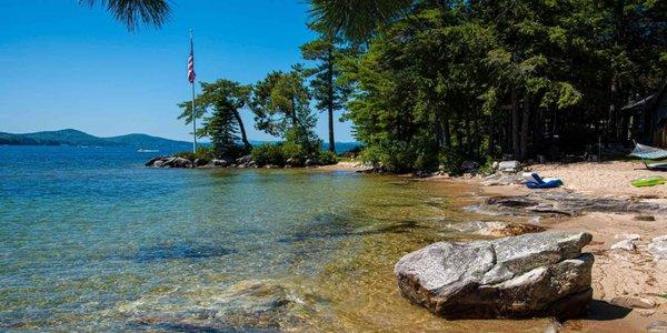 This is the beach of one of the finest Lake Winnipesaukee at www.45UmbrellaPoint.com