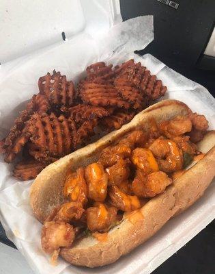 Pow Pow Shrimp Po Boy with sweet potato waffle fries.