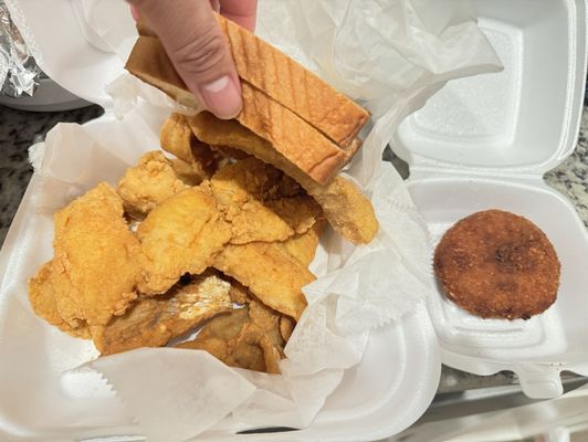 Six pieces of fish with two slices of bread. Plenty of sauce and crab cake.