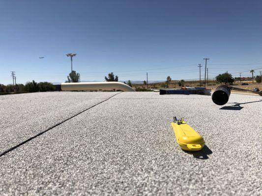 Torch-down roof in Edwards, CA installed by professionals at Colin Roofing Inc. Torch-down roofs are optimal for low-slope surfaces.