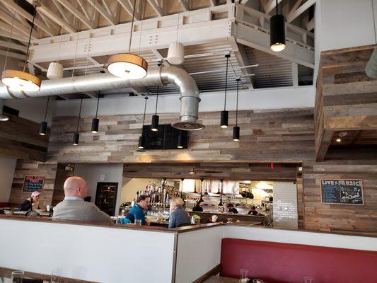 indoor seating with bar in the background.