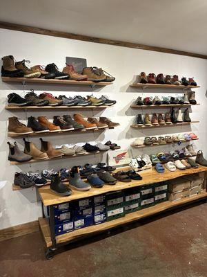 Men (left) and women's (right) shoe collection side by side at Proof Lab