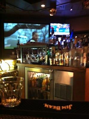 Large screen tv's surround the bar area