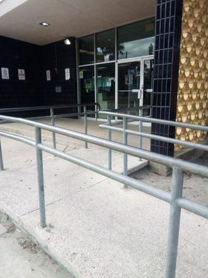 the entrance to the library and the table where I was quietly studying at