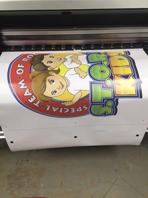 Full color banner on the printer for STORM KIDS.