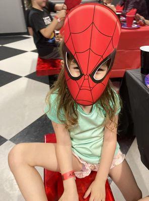 My daughter in a Spider-Man mask for the twins I nanny at their birthday party my daughter & I attended!