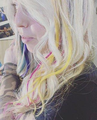 Pieces of hair. Colorful clip in Extensions