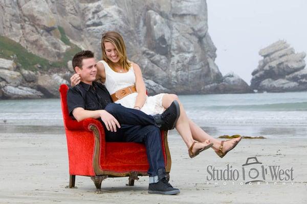 Engagement session in the red chair on Morro beach.