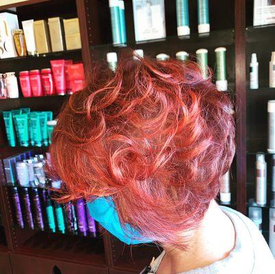 2 tone reds with layered curls.