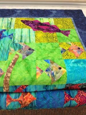 I loved quilting this happy quilt in the winter months for my client. Thank You!