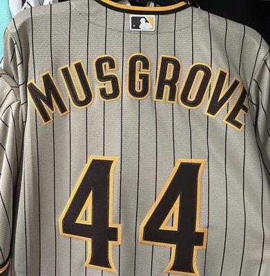 From Lids Fanatics store. Spacing very off on everything. Name too wide, numbers too far below name, space between the 4s is too far.