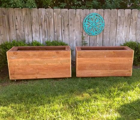 Custom planter boxes on wheels tp spruce up any garden. Contact us for your own!