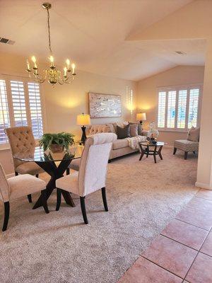 Staged to show this living room, dining room open living space.