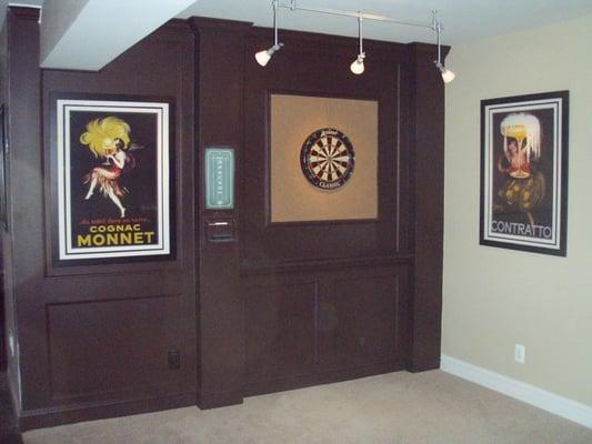 Built in dart board area, next to the bar