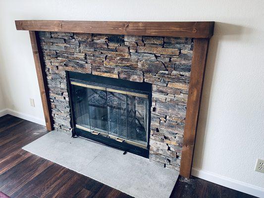 Fireplace natural stone with custom made mantel