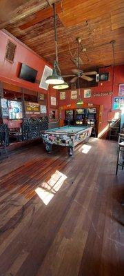 Upper deck has a pool table