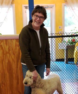 Owner Martha Hickey and a buddy from daycare playgroup.