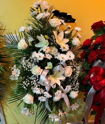 Disappointing $200 delivered funeral spray had half of the flowers displayed on ftd.com and it had a lot of fillers.