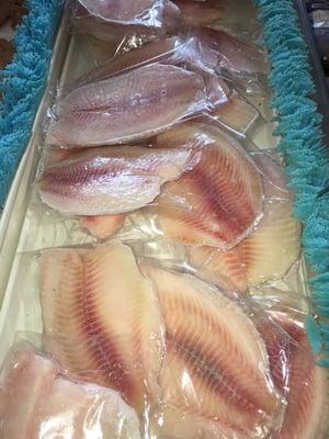 Individually packaged tilapia filet, sold as is by the pound, or cooked (deep fried, breaded, or on the griddle)