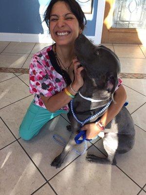 Pet Care Specialist, Solemi, getting some morning puppy love