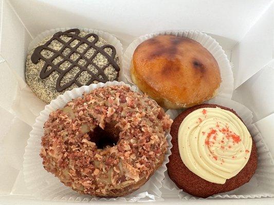 Croissant Donut Maple Bacon, S'mores, Creme Brulee Donut, Red Velvet Cake with Cream Cheese. Tasty, but pricey.