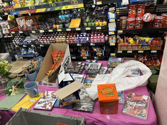 Beef jerky on other side of table has been expired for months. Have to lift table and all merchandise into the clogged aisle to get to