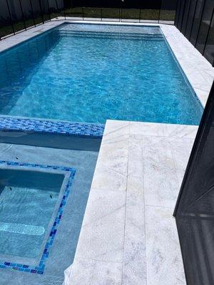 15 x 30 with spa on the exterior of the pool.