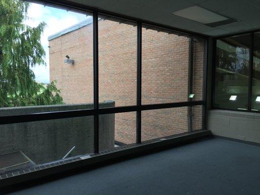 We removed the paint from the bottom of the window in the childwatch room to make it brighter.