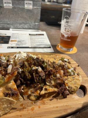 BBQ brisket nachos with Bear foot amber lager