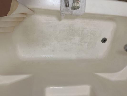 Stained, dirty gross tub.