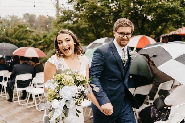 This is a great shot of me and my husband walking down the aisle, with my beautiful flowers!!