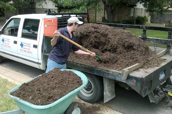 Want a fast way to improve the look of your home?  Mulch the flowerbeds!