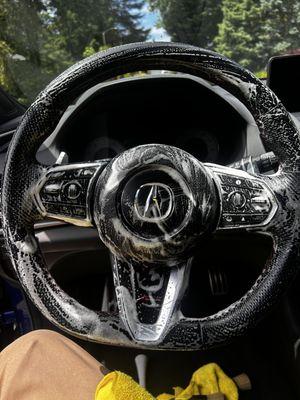 Cleaning, sanitizing steering wheel