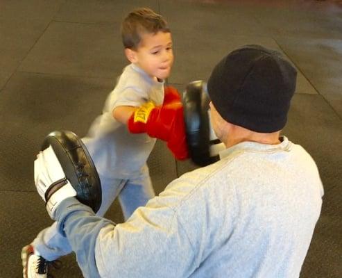 Bill training young Mike.