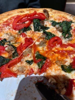 Italian sausage, spinach, and roasted red pepper pizza