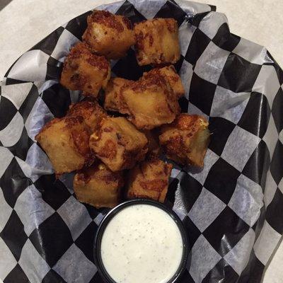 Bacon wrapped cheese curds.