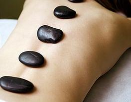 Hot Stone Therapy; heated at a comfortable temperature to massage your muscle tension away.