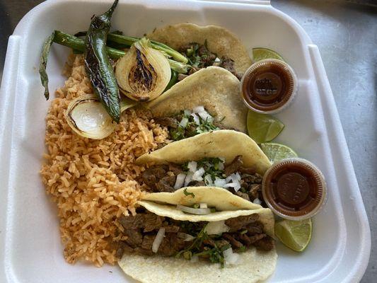 Asada tacos with rice and salsa