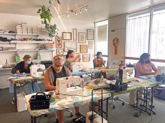 Stitch X Stitch Sewing For Beginners Class hard at work