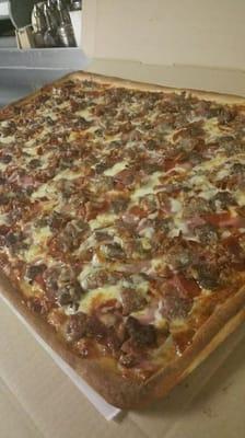 Meatlovers sheet pizza! Order 1 day ahead to enjoy one yourself.