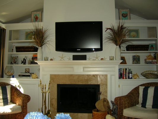 Custom shelving and storage space.  Perfect for a small room.