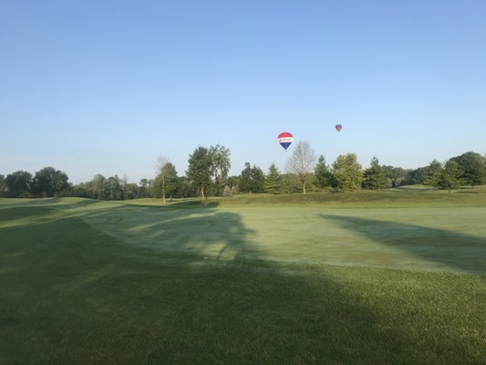 Always a good morning when the hot air balloons help the 1st hole look even more picture perfect.