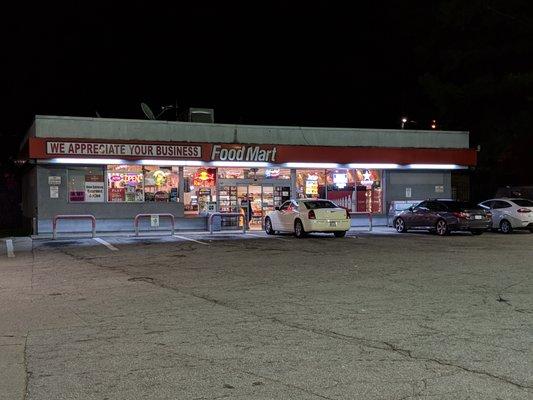 Outside the convenience store. Storefront. Food Mart.