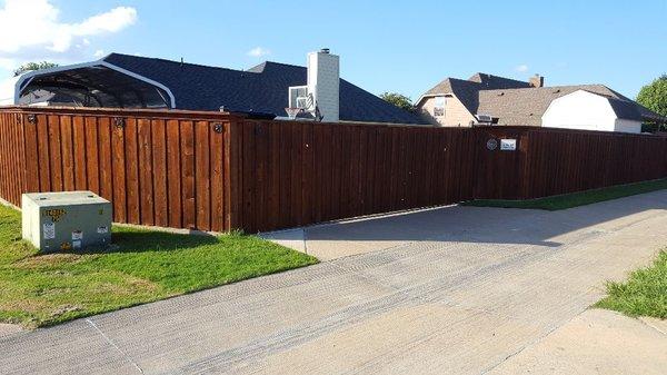 24' Sliding driveway gate with solar charged gel cell battery.