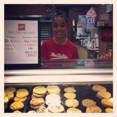 Nice lady working hard serving up cookies!!