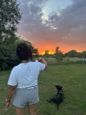 My sister and my dog and a stunning sunset.