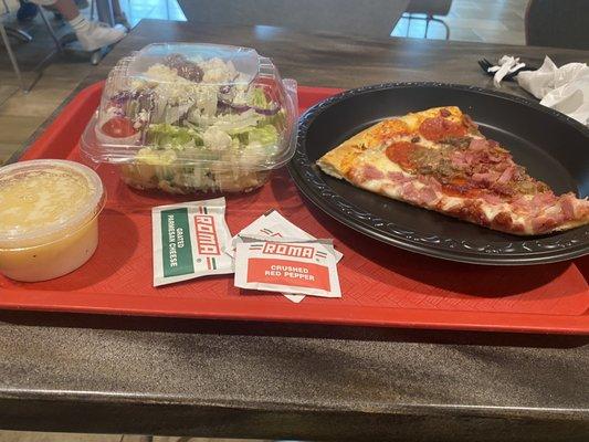 Slice of the Day Combo. Slice and green salad with drink. $9.69