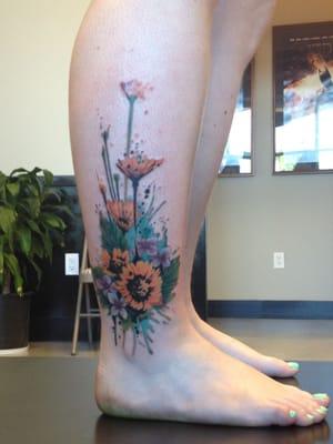 Watercolor flower tattoo by Jen Combustya. Photo taken 5 min after appointment.
 Love my new tattoo! Thanks, Jen!